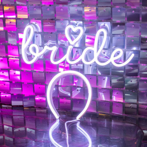Bride LED neon headband in white. Lights up with a supplied battery pack and can be customised.